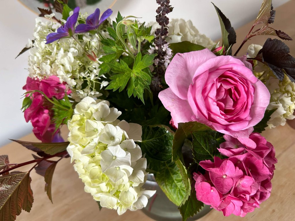 A vase is filled with flowers.